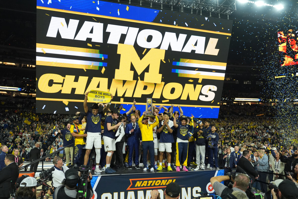 Michigan celebrates after defeating UConn in the NCAA college basketball tournament national championship game at the Final Four in Indianapolis, on April 6, 2026. (AP Photo/Michael Conroy)