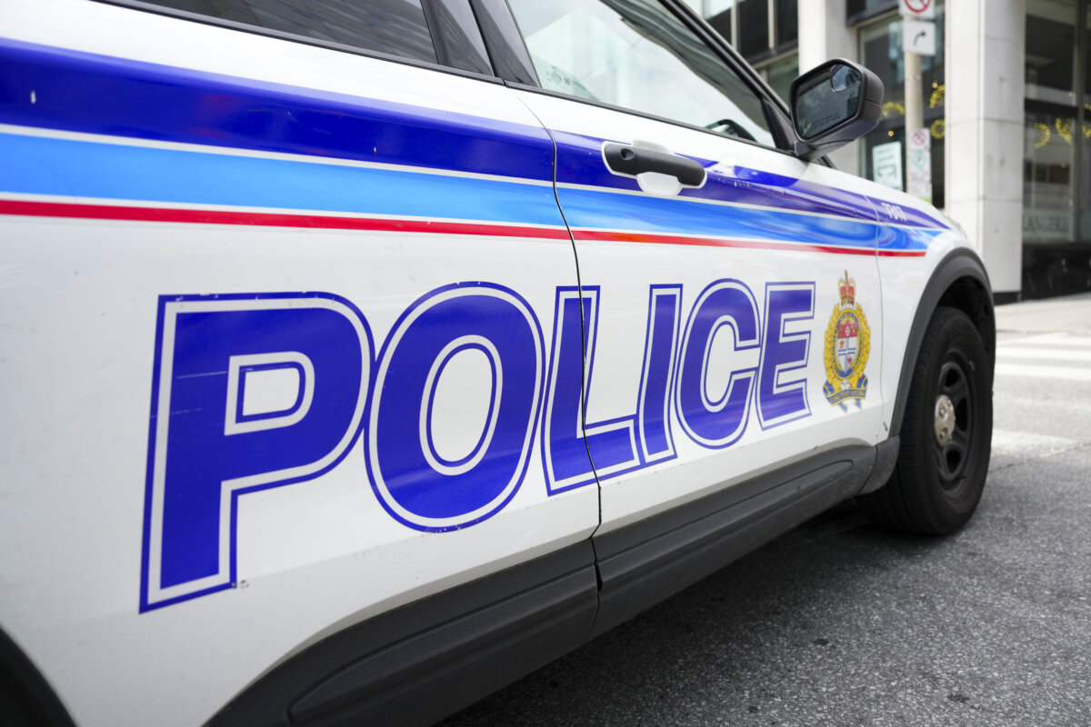 An Ottawa Police Service cruiser is parked at a scene in downtown Ottawa on Aug. 27, 2024. (The Canadian Press/Sean Kilpatrick)