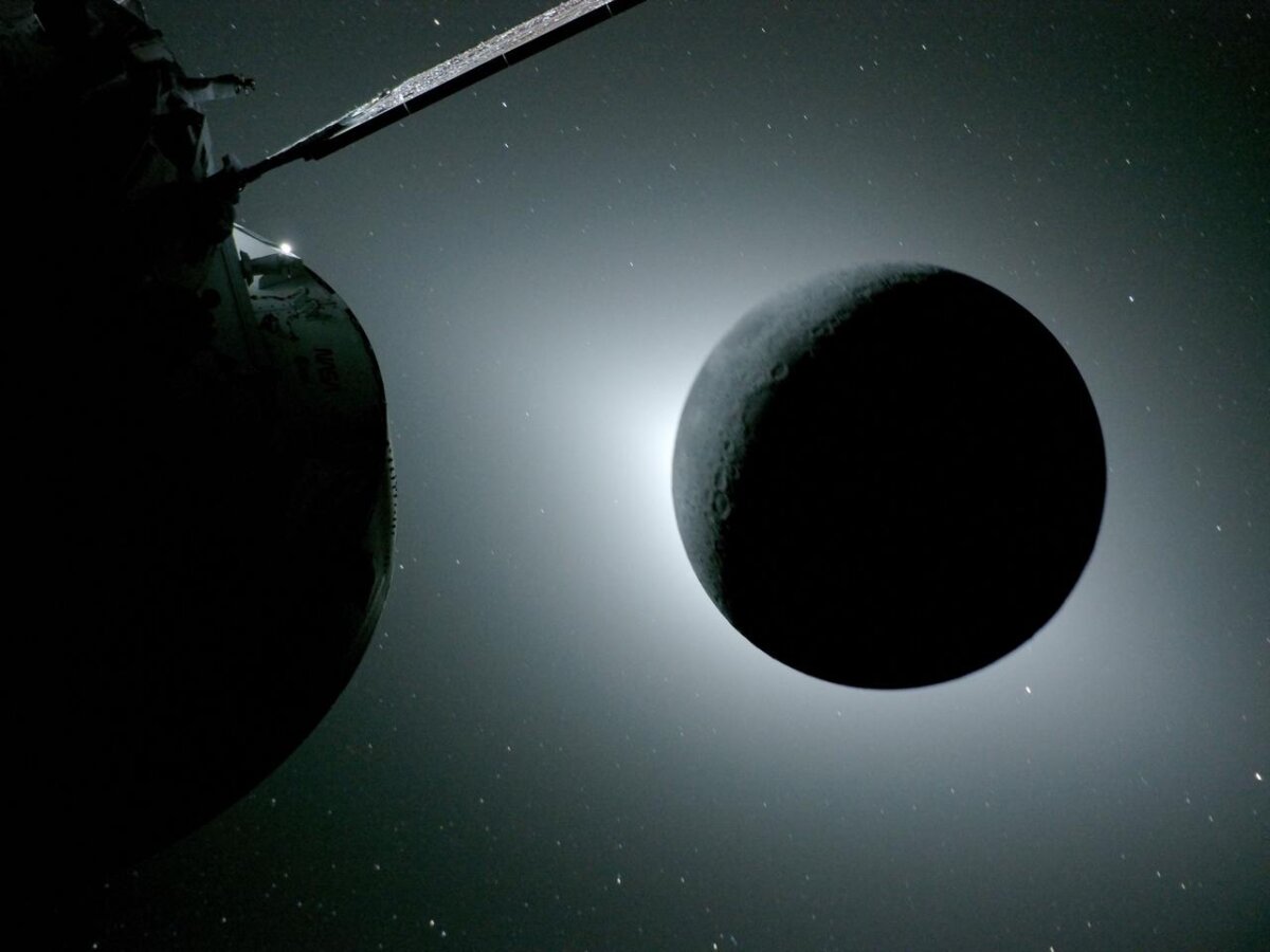 The Moon, seen here backlit by the Sun during a solar eclipse on April 6, 2026, is photographed by one of the cameras on the Orion spacecraft’s solar array wings. (Courtesy of NASA)