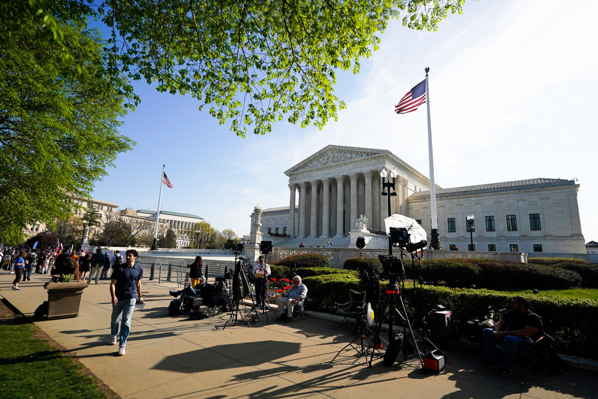 Members of the media set up outside the U.S. Supreme Court in Washington ahead of President Donald Trump's expected arrival on April 1, 2026. (Al Drago/Getty Images)