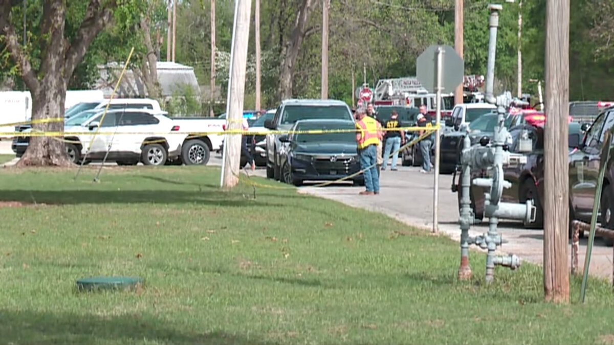 Authorities block off an area following a shooting inside a high school in Pauls Valley, Okla., on April 7, 2026. (KFOR via AP)