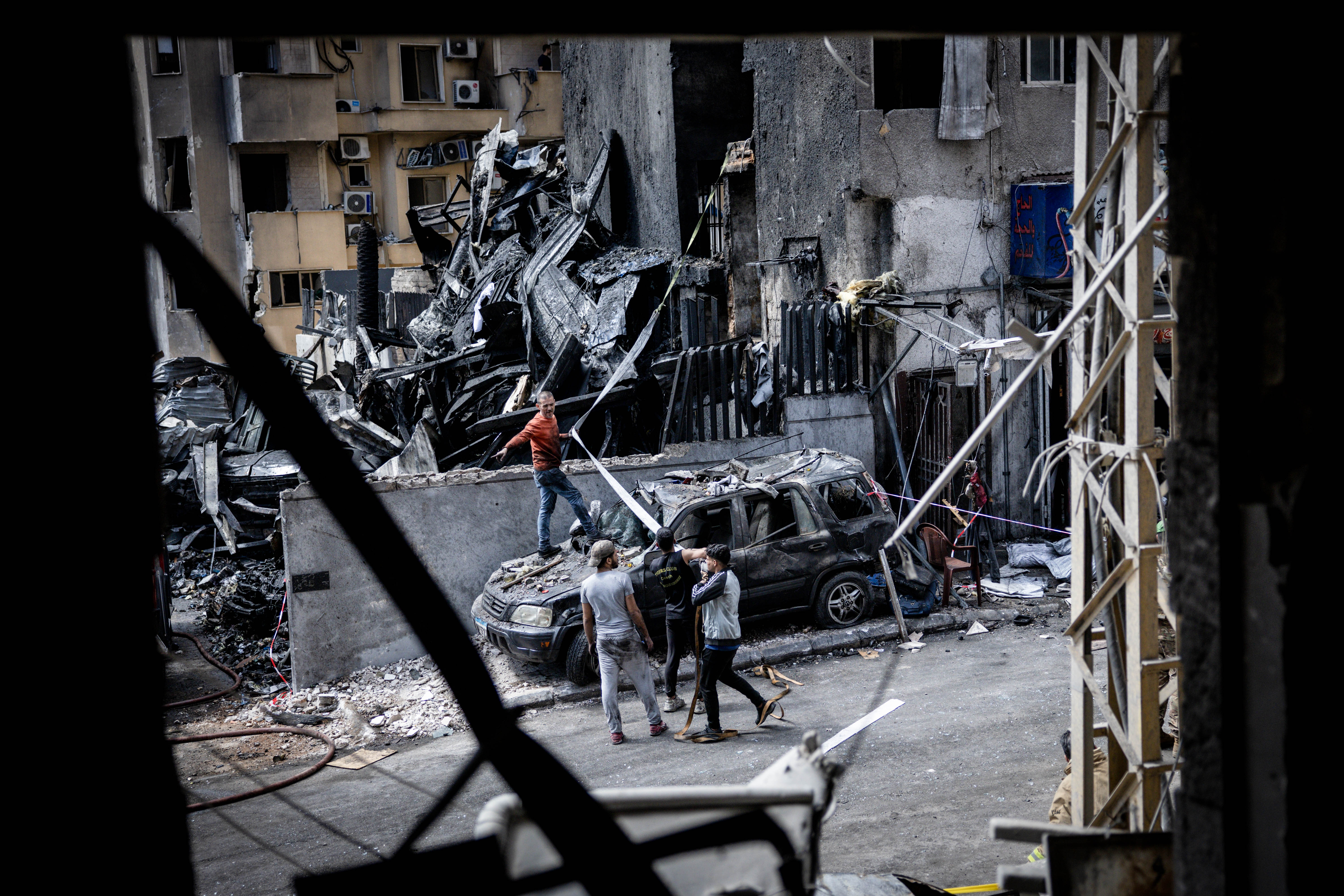 Day in Photos: Israeli Strikes in Lebanon, Protests in Venezuela, and Kenyan Tea Farmers