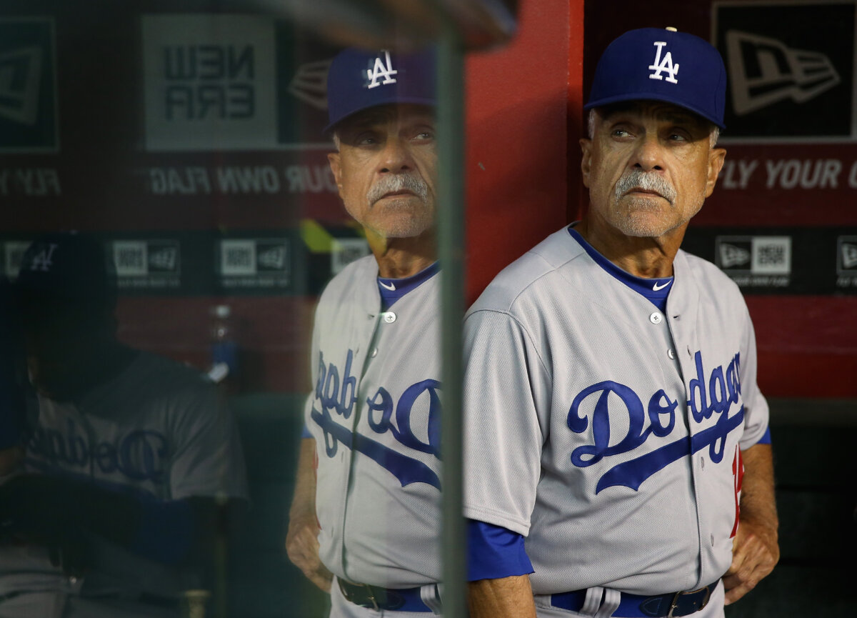 First base coach Davey Lopes #15 of the Los Angeles Dodgers watches from the dugout during the MLB game against the Arizona Diamondbacks at Chase Field in Phoenix, Arizona on August 27, 2014. (Christian Petersen/Getty Images)
