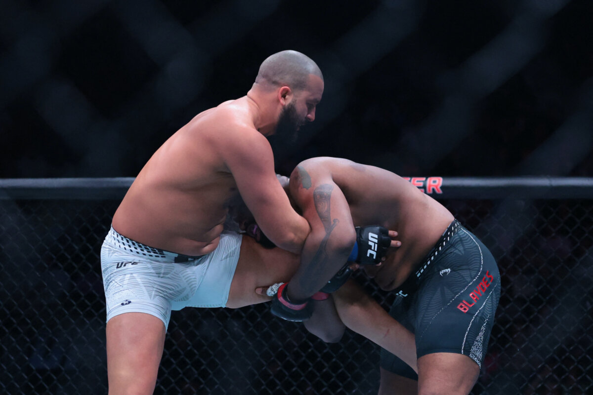 Curtis Blaydes (red gloves) fights Josh Hokit (blue gloves) during UFC 327 at Kaseya Center in Miami, on April 11, 2026. (Sam Navarro-Imagn Images via Reuters)