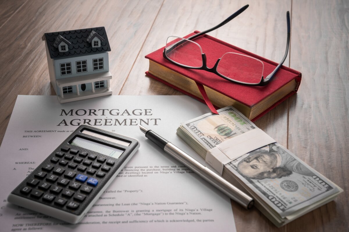 Bankruptcy can provide relief from debt and temporarily stop foreclosure, but your mortgage lender’s claim on the home still remains. (ssguy/Shutterstock)