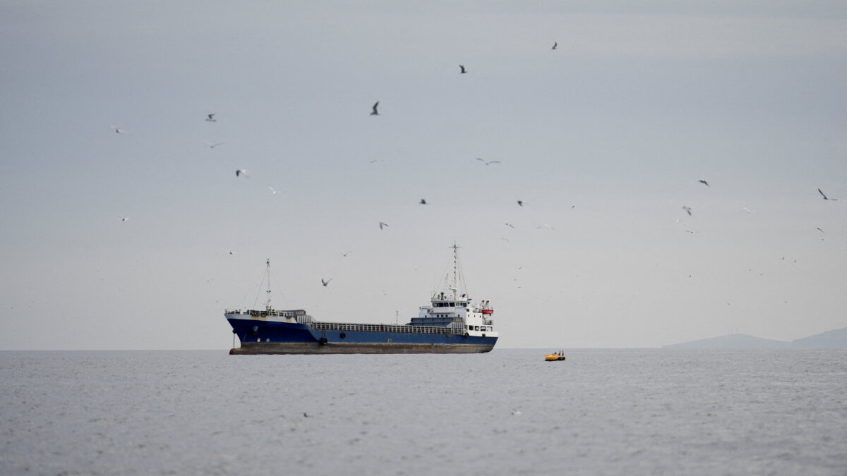 A vessel at the Strait of Hormuz, off the coast of Oman’s Musandam province, on April 12, 2026. (Reuters)