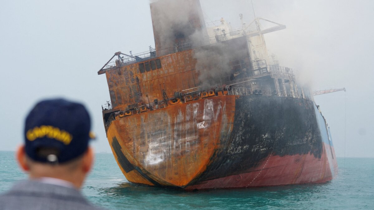 A tanker carrying fuel oil is damaged following unidentified attacks, near Basra, Iraq, on March 12, 2026. (Reuters/Mohammed Aty/File Photo)