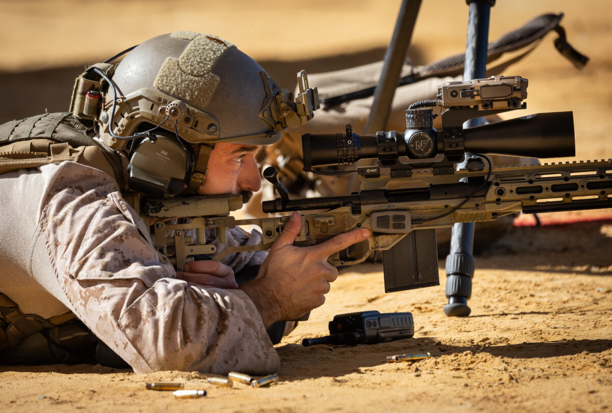 U.S. Marine Staff Sgt. Tyler Johnson of the U.S. Marine Corps performs shooting exercises at Fort Benning, Ga., on April 8, 2026. (John Fredricks/The Epoch Times)