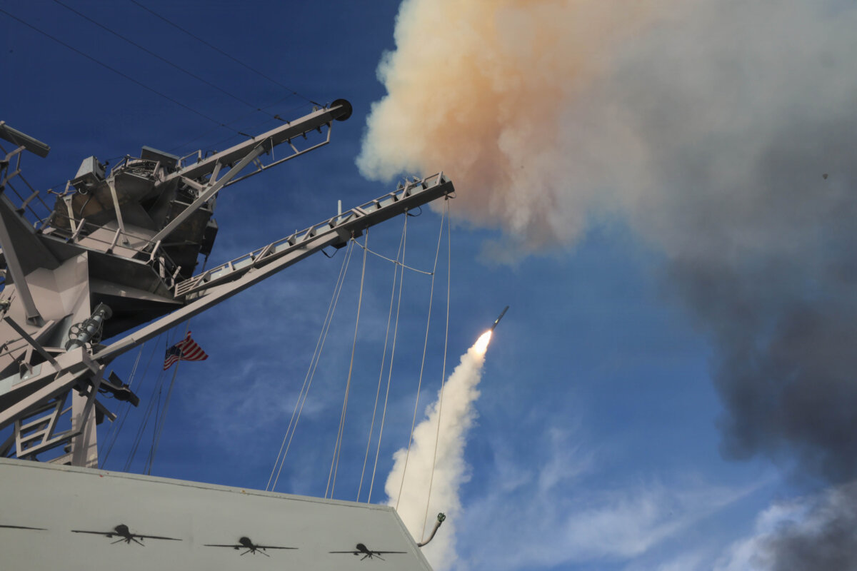 Arleigh Burke-class guided-missile destroyer USS Thomas Hudner (DDG 116) fires a Tomahawk land attack missile during Operation Epic Fury on March 21, 2026. (U.S. Navy Photo)