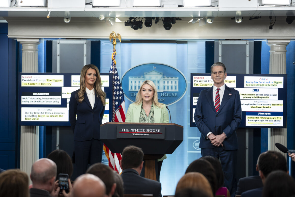 White House press secretary Karoline Leavitt, Administrator of the U.S. Small Business Administration, Kelly Loeffler, and Treasury Secretary Scott Bessent speak during a press conference at the White House in Washington on April 15, 2026. (Madalina Kilroy/The Epoch Times)