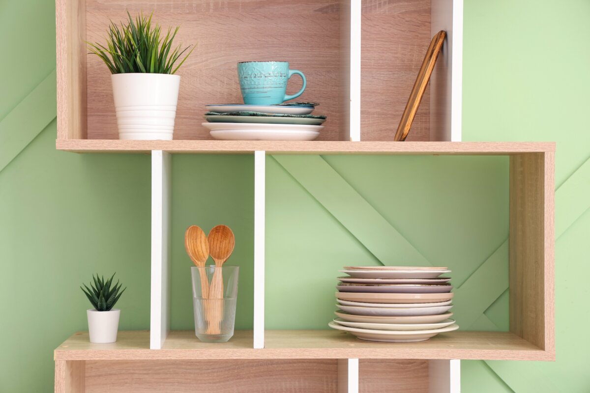Don't just immediately start drilling holes all over the wall. Take some time to consider what you will store on each shelf and even put some thought in to what you might want to store in the future. (Pixel-Shot/Shutterstock)