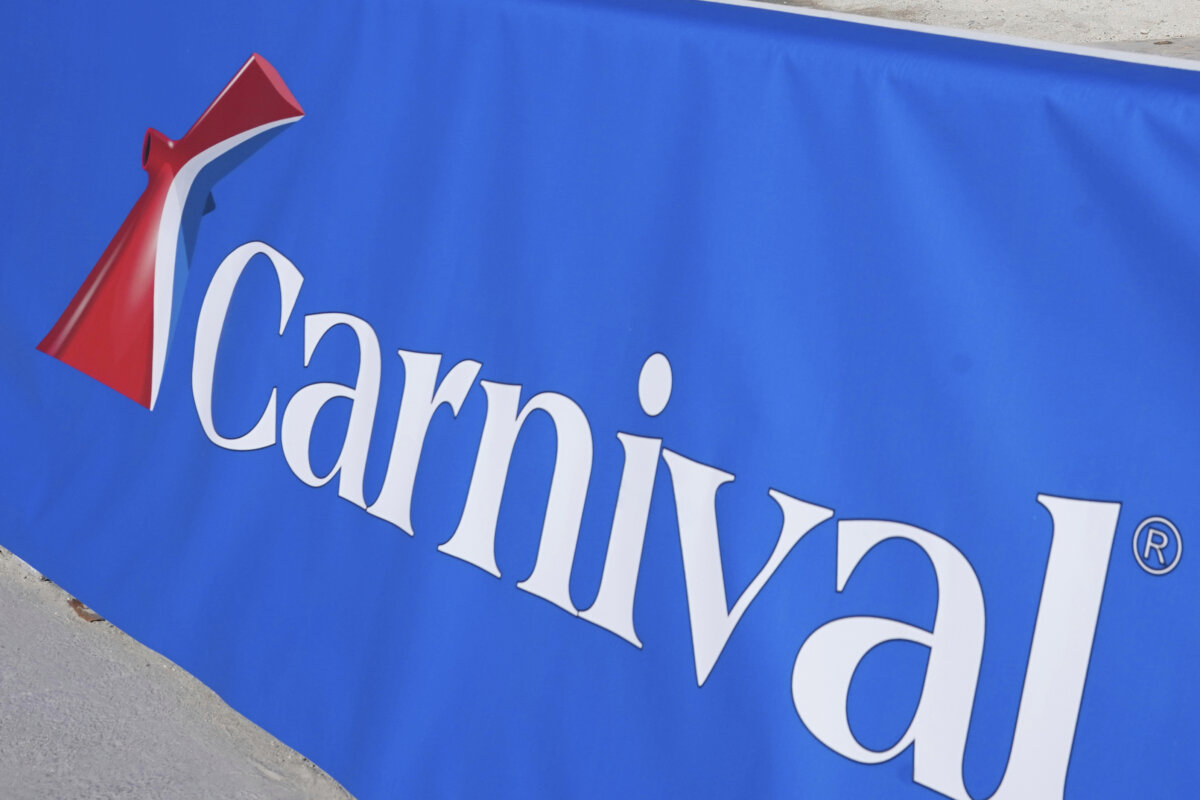 A Carnival Cruise Line sign is displayed at PortMiami in Miami on Jan. 29, 2021. (Lynne Sladky/AP Photo)