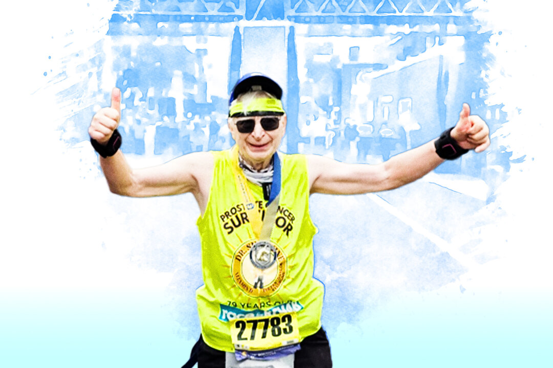 Dr. Michael F. Holick crosses the finish line of the Boston Marathon. (Courtesy of Kim Chisholm)