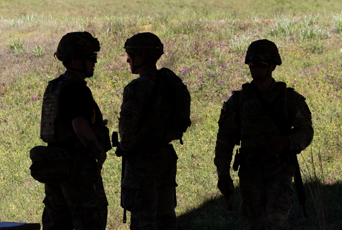 Soldiers of the U.S. Army Rangers perform in combat exercises at Fort Benning, Ga., on April 10, 2026. (John Fredricks/The Epoch Times)