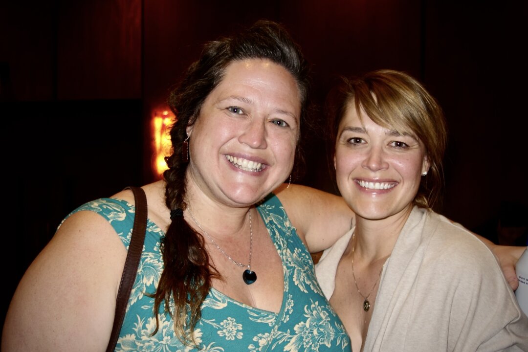 Annie Brandon (L) and Grace Campbell enjoyed Shen Yun's evening show at the Keller Auditorium on April 18, 2026. (Frank Zhang/The Epoch Times)