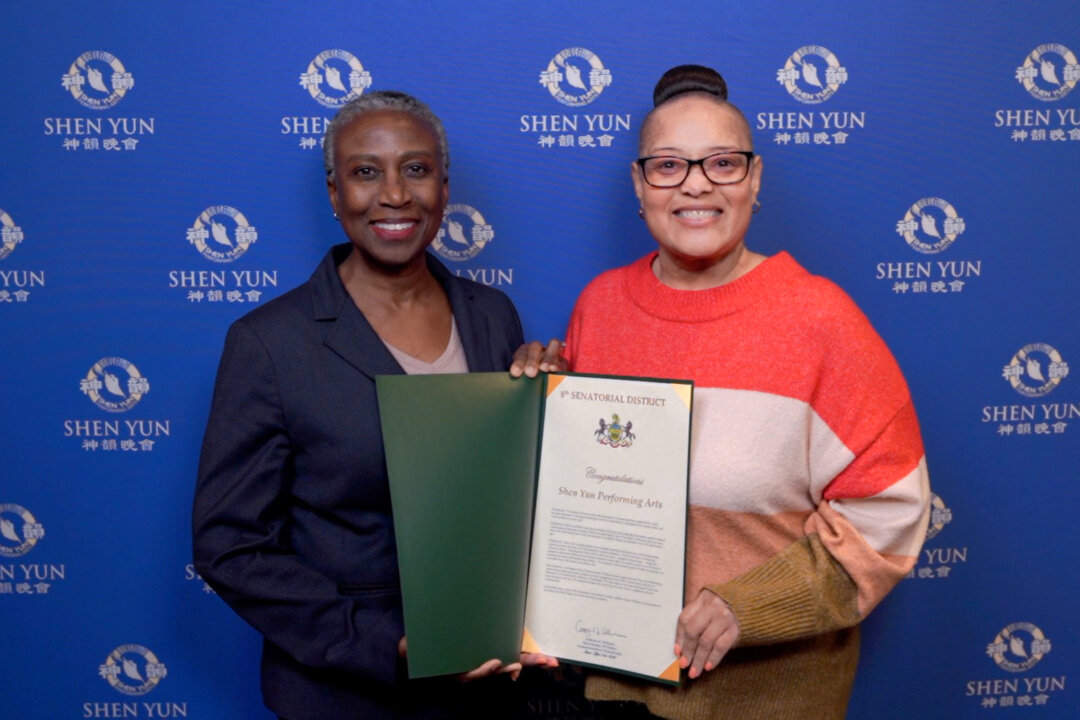 Brenda Tate (R) presents a certificate of appreciation to Shen Yun Performing Arts, accepted by Shen Yun's Philadelphia presenter's representative Yvette Scarlett, and attends Shen Yun Performing Arts, at the Miller Theater on April 19, 2026. (Steve Wen/The Epoch Times)