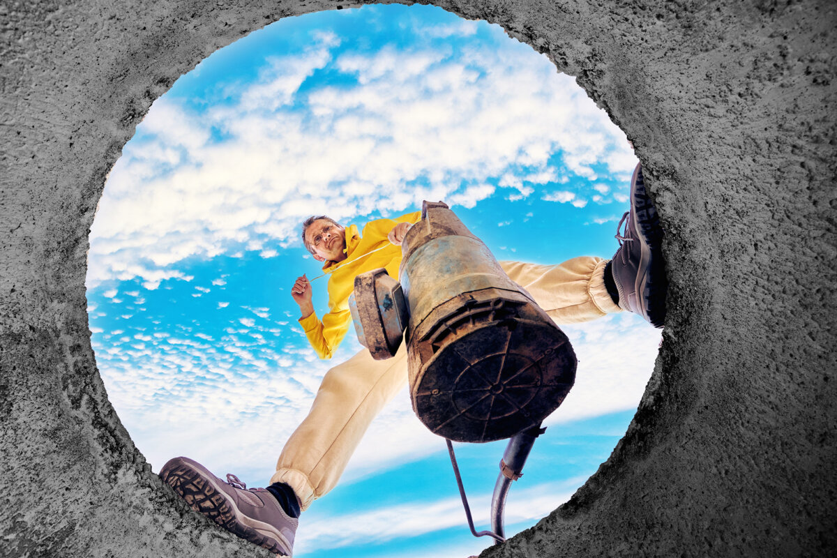 Many septic tanks are located underground in residential yards and require regular maintenance to function properly. (Grigvovan/Shutterstock)