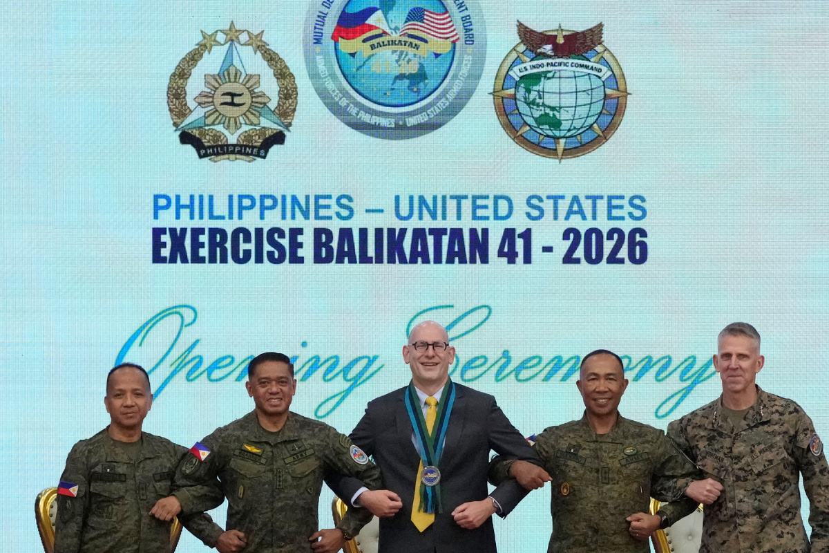 (L-R) Philippine exercise director Maj. Gen. Francisco Lorenzo Jr., Philippine military Chief of Staff Gen. Romeo Brawner, U.S. Charge d' Affaires Ad interim Y. Robert Ewing, Philippine Deputy Chief of Staff for Operations J3 Maj. Gen. Elmer Suderio, and U.S. Commanding General of the Marine Expeditionary Force Lt. Gen. Christian Wortman pose during a joint military exercise at Camp Aguinaldo military headquarters in Quezon City, Philippines, on April 20, 2026. (Aaron Favila/AP Photo)