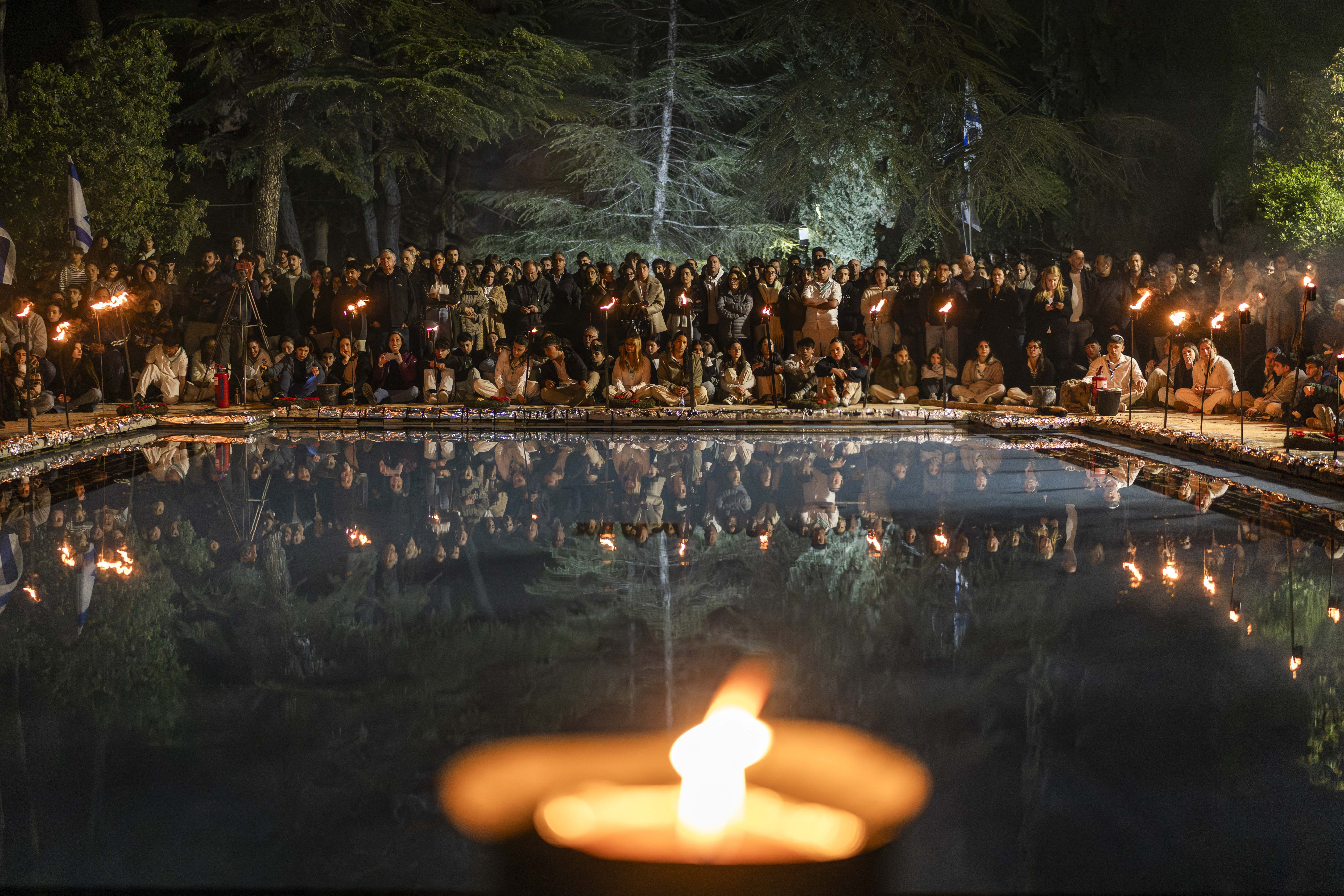 Day in Photos: Shooting in Louisiana, Boston Marathon, and Hill of the Seven Colors