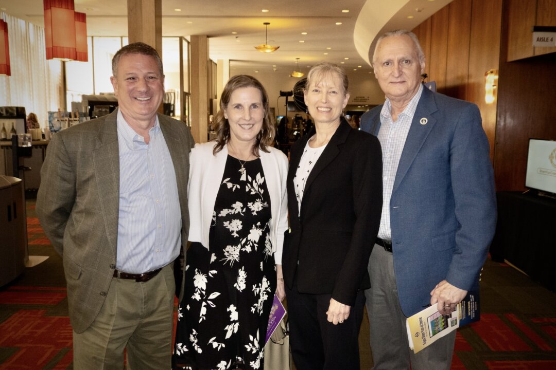 Scott Hefren and his wife (R), together with friends, attended a performance by Shen Yun Touring Company at the Keller Auditorium in Portland, Oregon, on April 18, 2026. (Jane Yang/The Epoch Times)