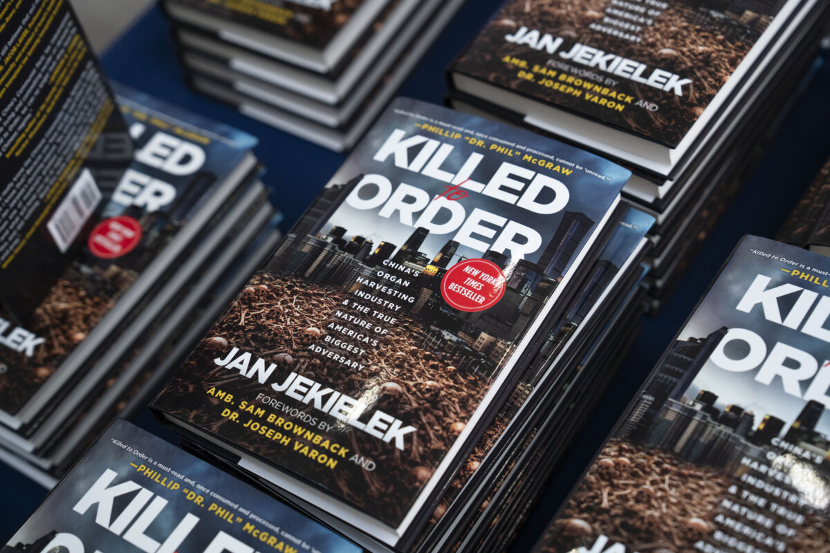 Jan Jekielek, Epoch Times senior editor and author of "Killed to Order,” receives the French Quarter Magazine 2026 Best Author of the Year award at the French Embassy in Washington on April 20, 2026. (Madalina Kilroy/The Epoch Times)