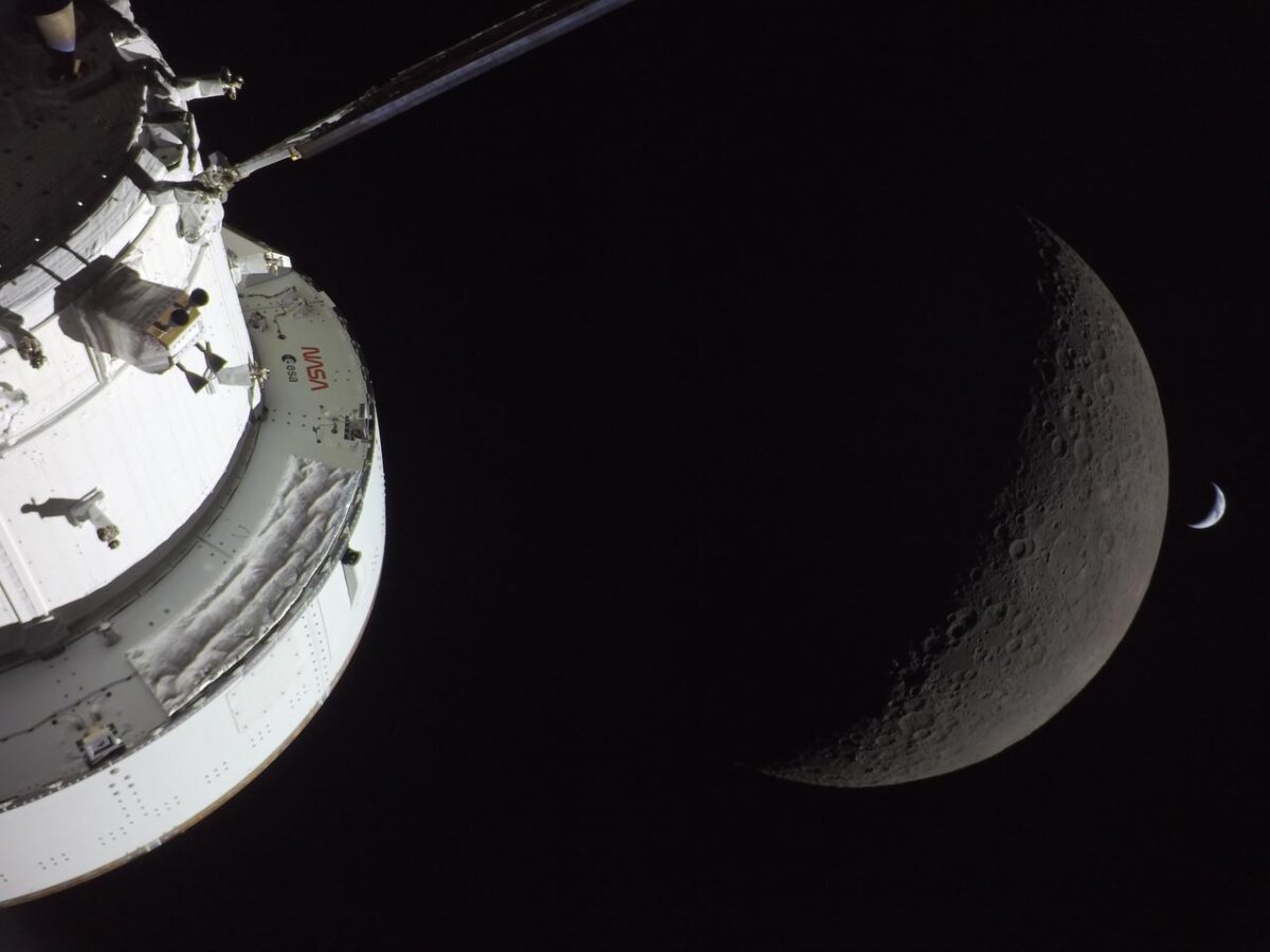 NASA’s Orion spacecraft captures the Moon and the Earth in one frame during the Artemis II crew’s deep space journey at 6:39 p.m. ET on April 6, 2026. (Courtesy of NASA)