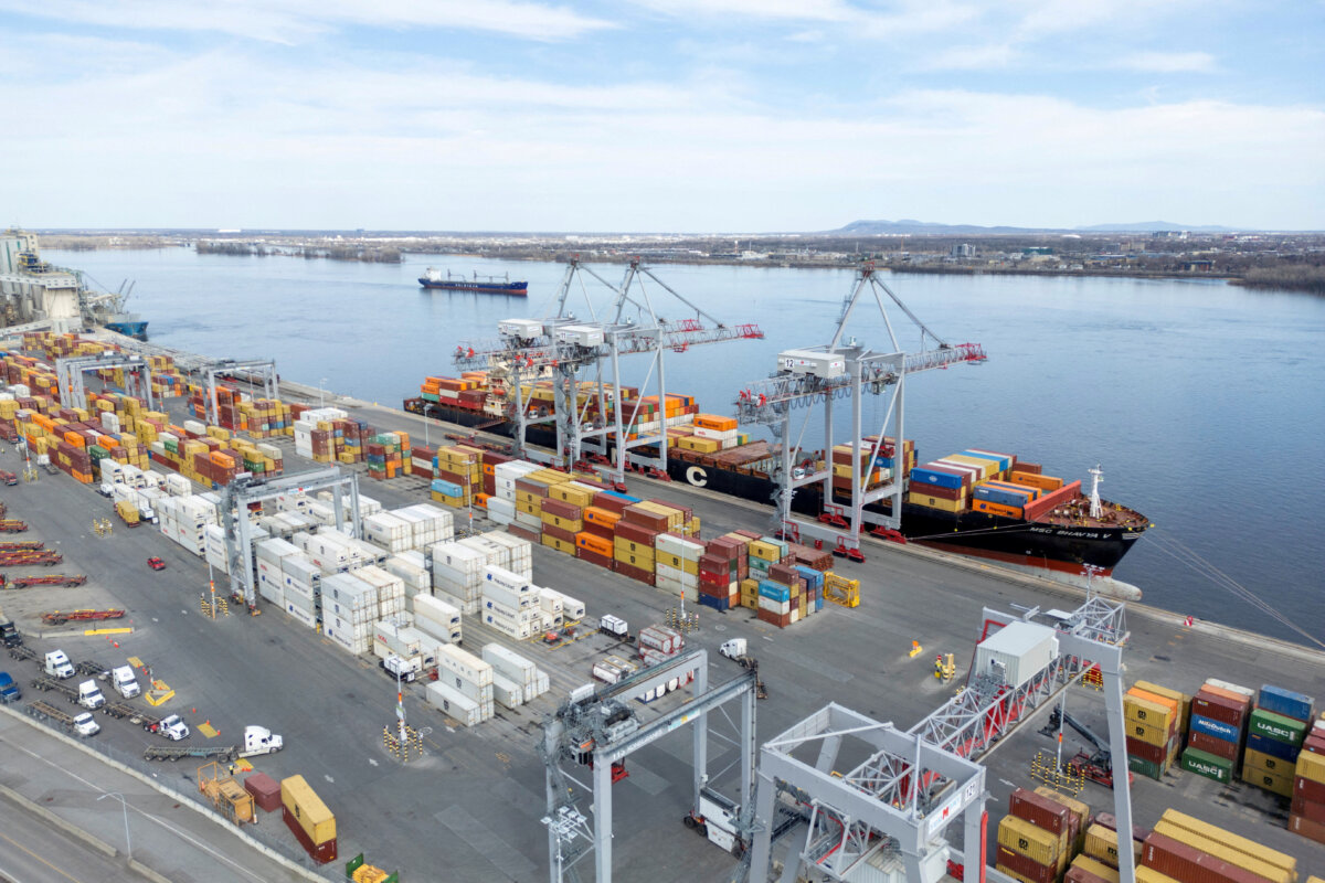 Shipping containers and transport trucks at the Port of Montreal on April 14, 2025. (Reuters/Carlos Osorio/File Photo)