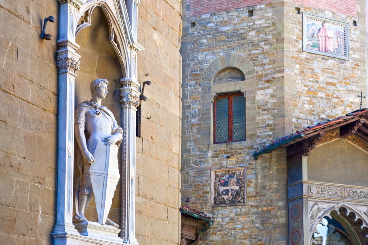 A marble replica of Donatello’s St. George guards the Guild of Armorers and Swordmakers niche on the façade of Orsanmichele Church, Florence, Italy. (Gimas/Shutterstock)
