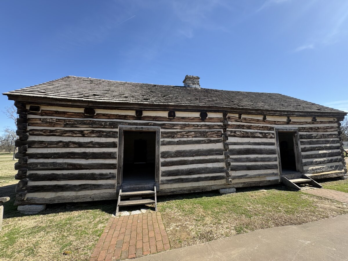 The wooden cabin where Alfred Jackson lived has been restored for visitors. (Deena Bouknight)