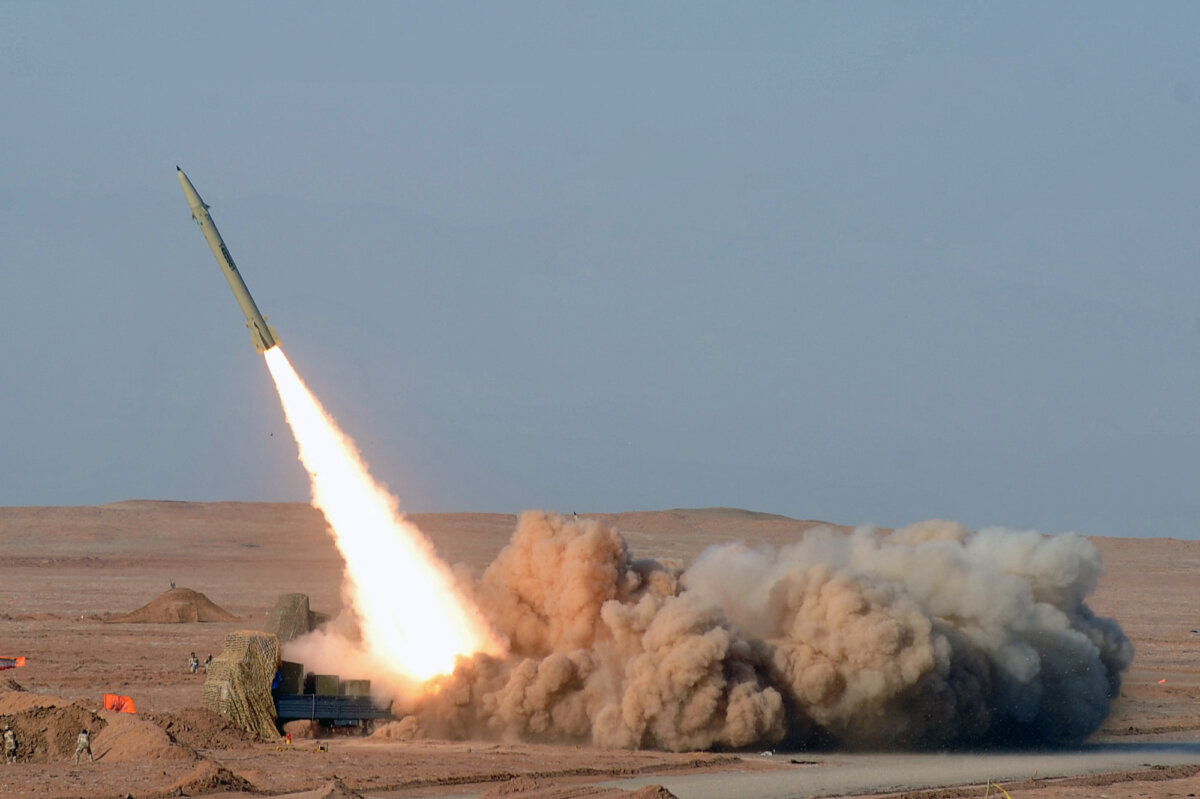 A photo obtained from Iran's ISNA news agency shows an Iranian short-range missile (Fateh) launched during the second day of military exercises, codenamed Great Prophet-7, for Iran's elite Revolutionary Guards in Iran's Kavir Desert, on July 3, 2012. (Arash Khamoushi / ISNA News Agency /AFP via Getty Images)
