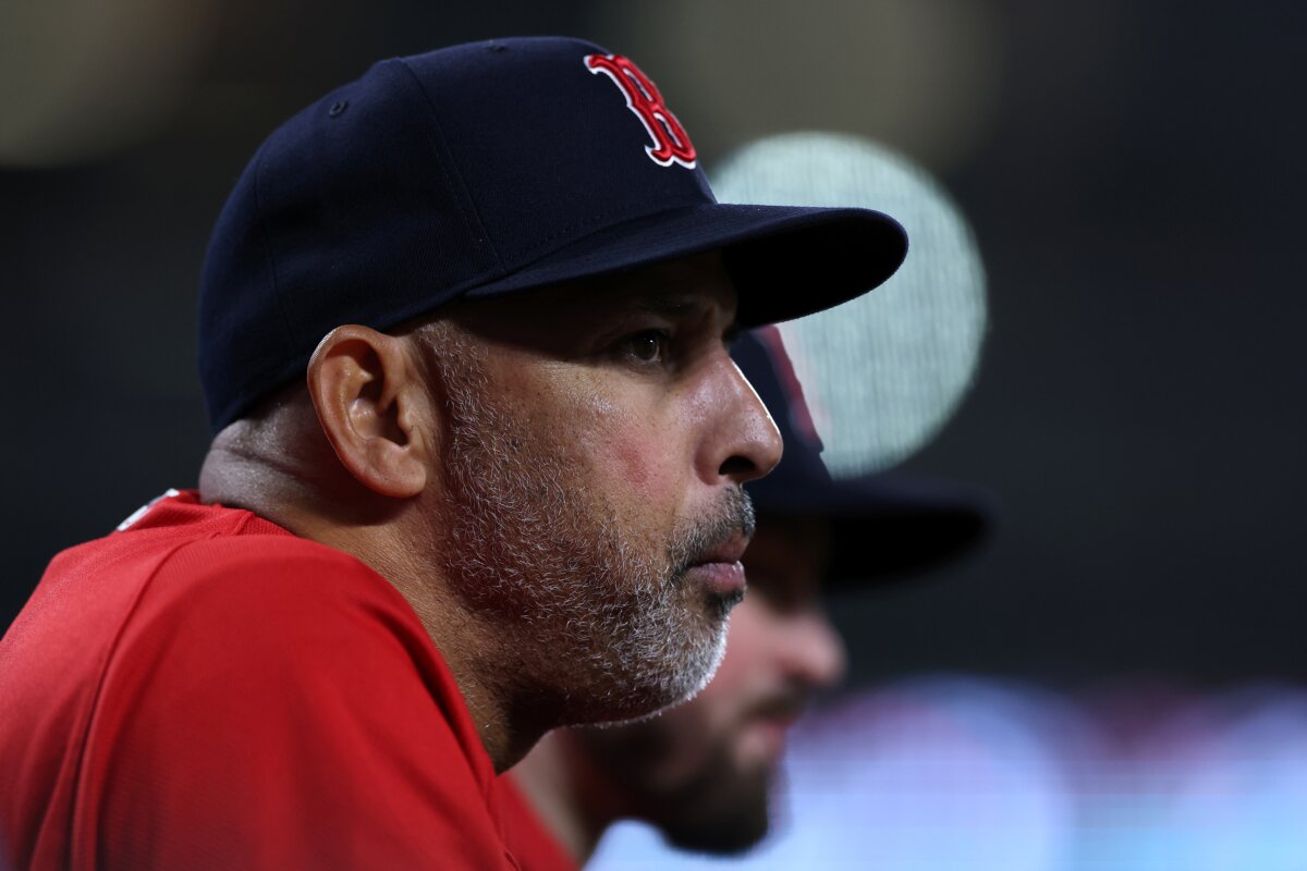 Manager Alex Cora of the Boston Red Sox looks on from the dugout against the Baltimore Orioles at Oriole Park at Camden Yards in Baltimore, Md., on April 24, 2026. (Patrick Smith/Getty Images)