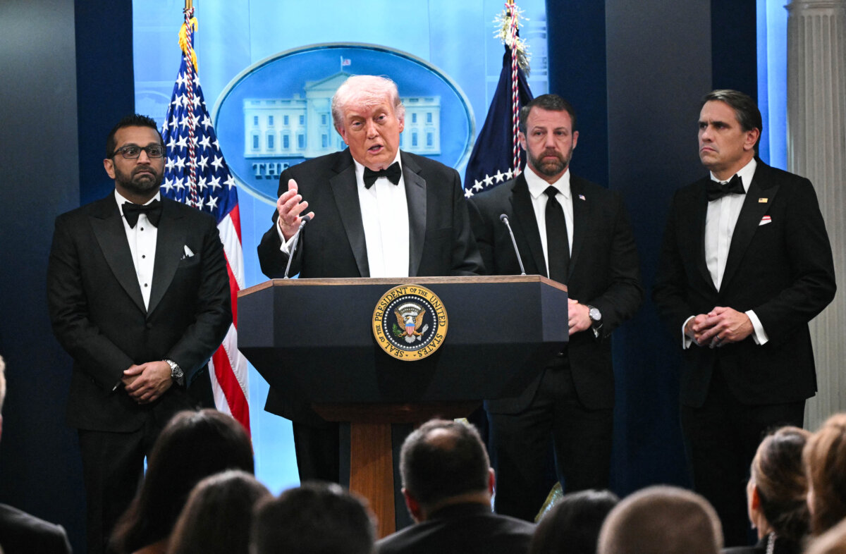 President Donald Trump speaks, flanked by FBI Director Kash Patel, Secretary of Homeland Security Markwayne Mullin, and Acting Attorney General Todd Blanche, during a press briefing in the Brady Briefing Room at the White House in Washington, shortly after a shooting incident at the White House Correspondents' Dinner, on April 25, 2026. (Mandel Ngan/AFP via Getty Images)