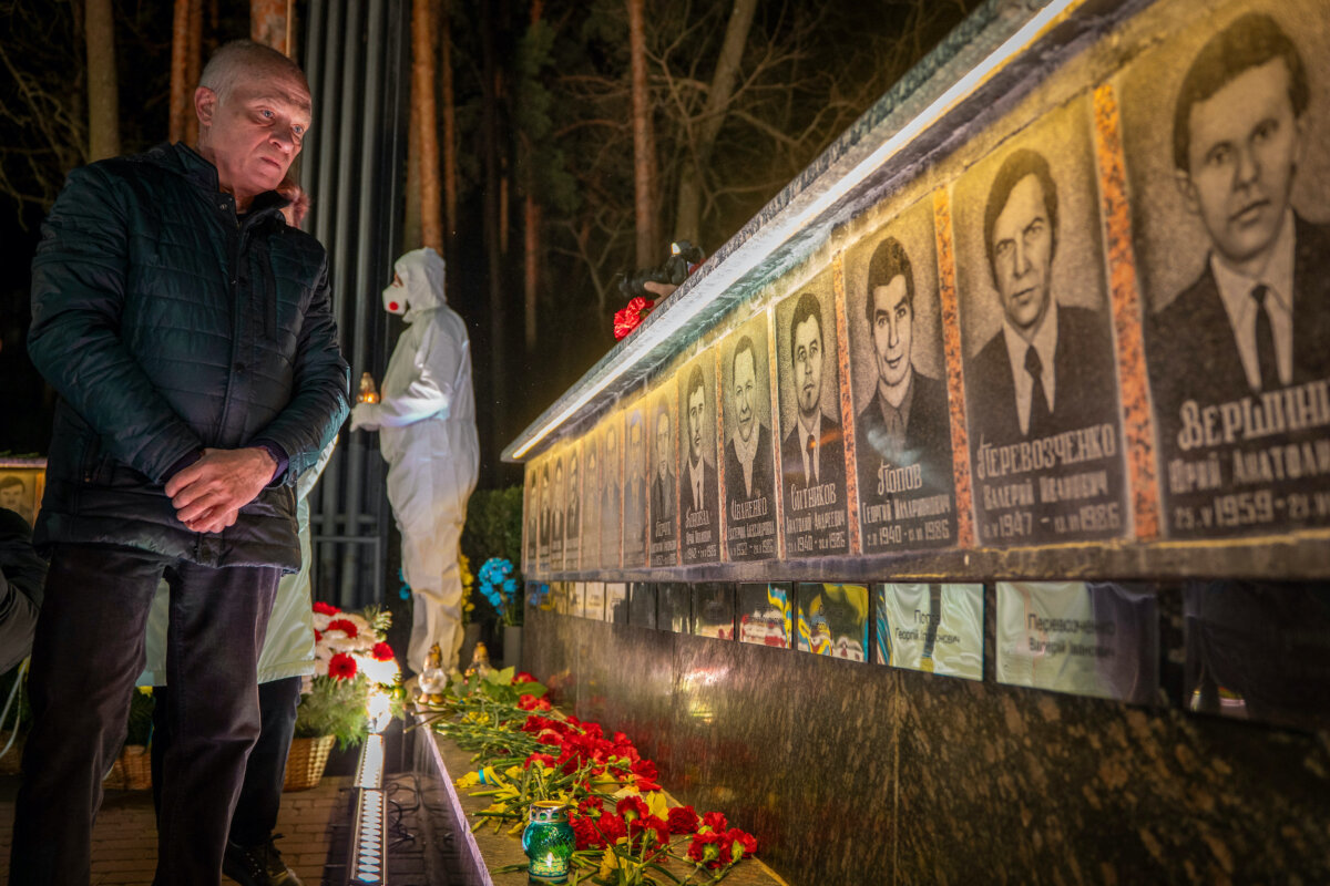 A man looks at a memorial dedicated to firefighters and workers who died after the 1986 Chornobyl (Chernobyl) nuclear disaster, ahead of its 40th anniversary in Slavutych, Ukraine, οn April 25, 2026. Chornobyl is the Ukrainian name for the city. (Dan Bashakov/AP Photo)