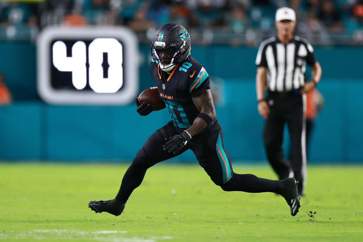 Tyreek Hill of the Miami Dolphins runs for yards after a catch during the first half against the New York Jets at Hard Rock Stadium in Miami Gardens on Sept. 29, 2025. (Carmen Mandato/Getty Images)