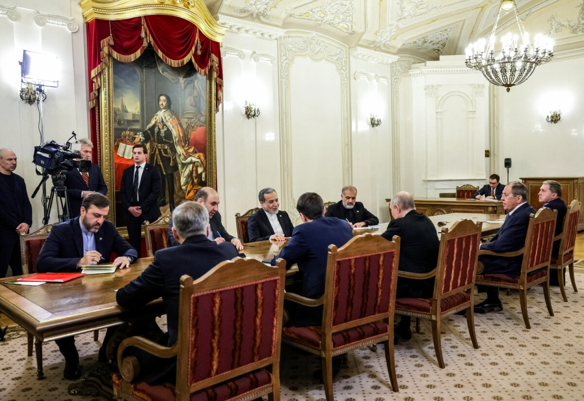 Russian President Vladimir Putin and Iranian Foreign Minister Abbas Araghchi hold talks at the Boris Yeltsin Presidential Library in Saint Petersburg, Russia, on April 27, 2026. (Gavriil Grigorov/Pool/AFP via Getty Images)
