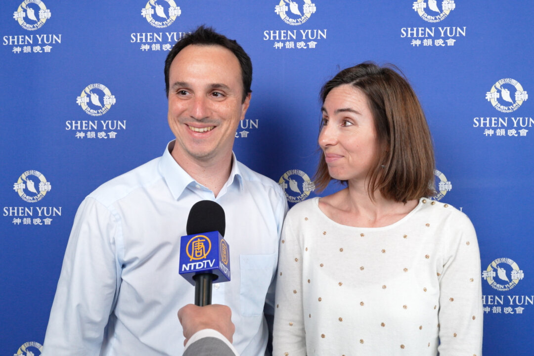 Michel Escoffre and Anne Garnier attend Shen Yun Performing Arts in Toulouse, France, on April 24, 2026. (NTD)