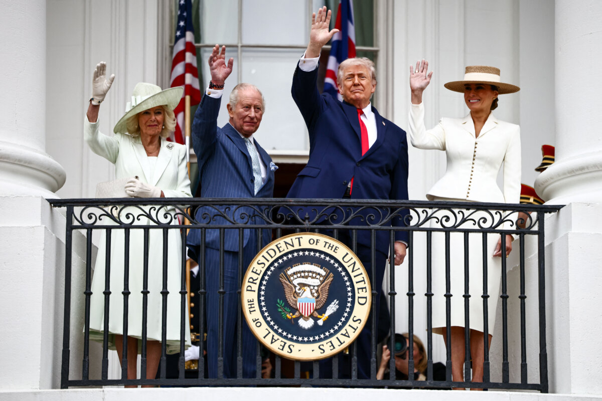 (L-R) Britain's Queen Camilla, King Charles III, President Donald Trump, and First Lady Melania Trump during an arrival ceremony on the South Lawn of the White House on April 28, 2026. (Henry Nicholls/Pool/AFP via Getty Images)