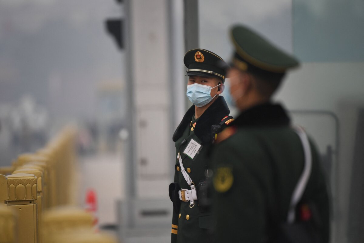 Paramilitary police stand guard at Tiananmen Square ahead of the closing session of the Chinese People's Political Consultative Conference in Beijing on March 10, 2021. (Noel Celis/AFP via Getty Images)