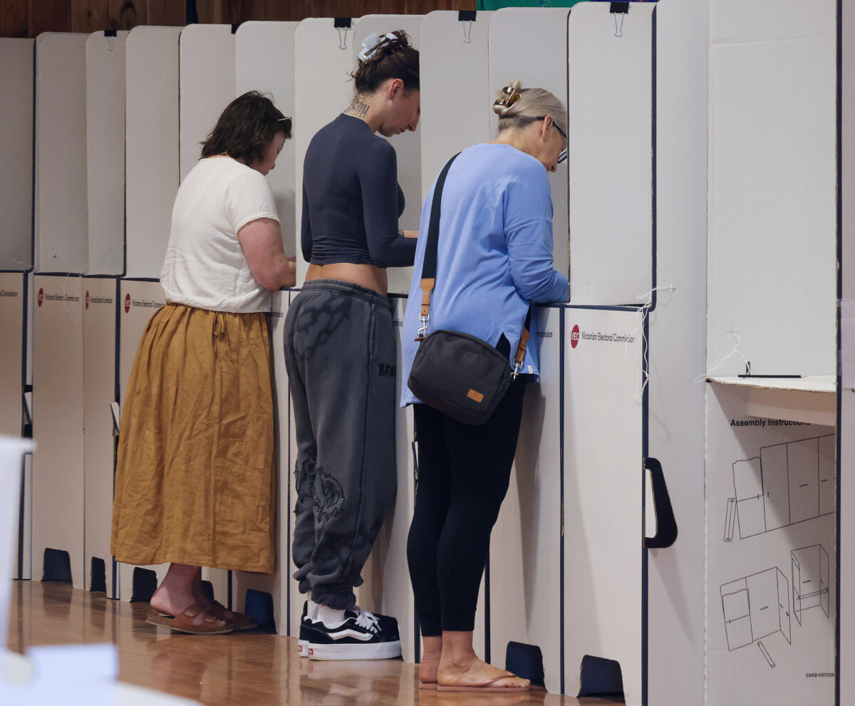 People cast their vote for the seat of Nepean during the 2026 Nepean By-Election in Melbourne, Australia, on May 2, 2026. (AAP Image/Ian Currie)