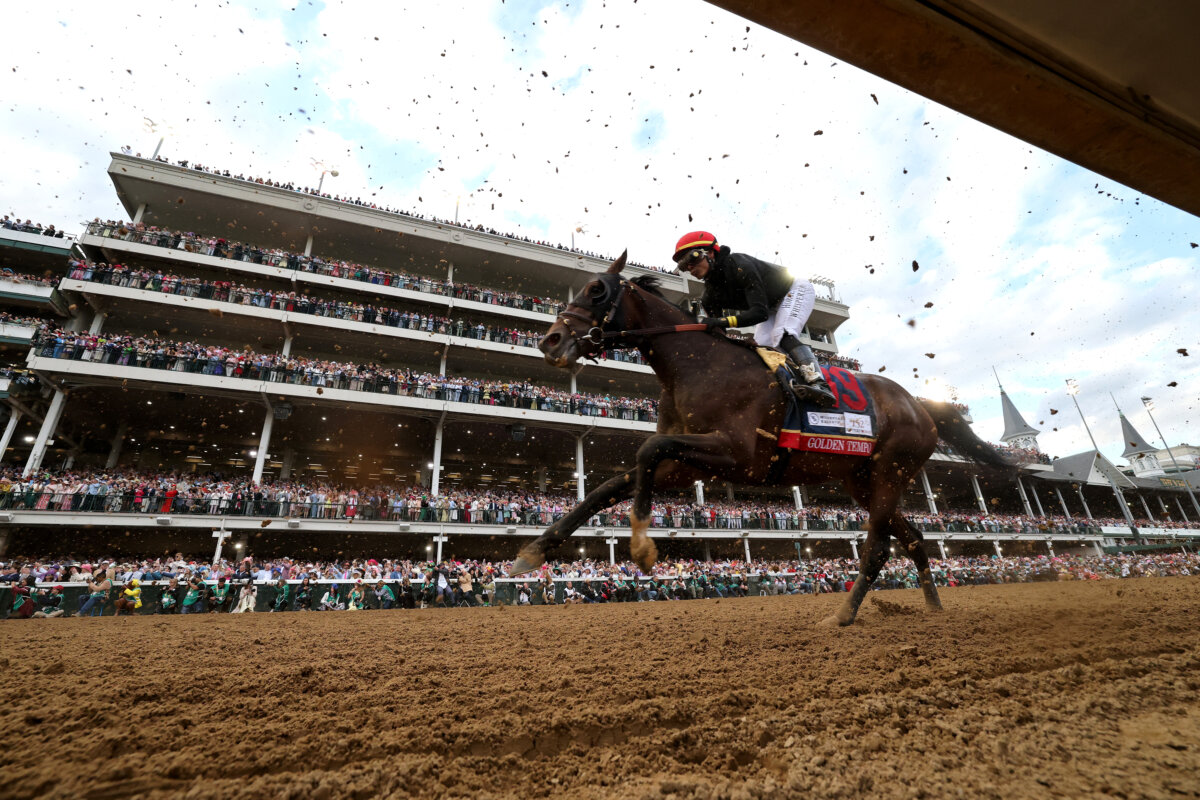 Golden Tempo #19, ridden by jockey Jose Ortiz, heads into the first turn the 152nd running of the Kentucky Derby at Churchill Downs in Louisville, Ky., on May 2, 2026. (Michael Reaves/Getty Images)