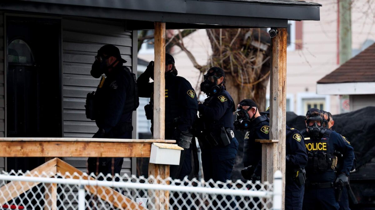 The Ontario Provincial Police conduct a search at an unspecified residence in connection with a $4.1 million drug bust. It was one of several in Cornwall, Ont., and Montreal. (OPP handout photo)