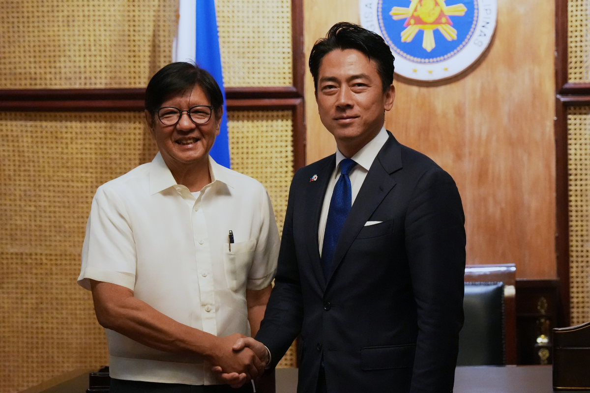 Philippine President Ferdinand Marcos Jr., (L) greets Japan's Defense Minister Shinjiro Koizumi at the Malacanang presidential palace in Manila, Philippines, on May 5, 2026. (Aaron Favila/Pool/AP Photo)
