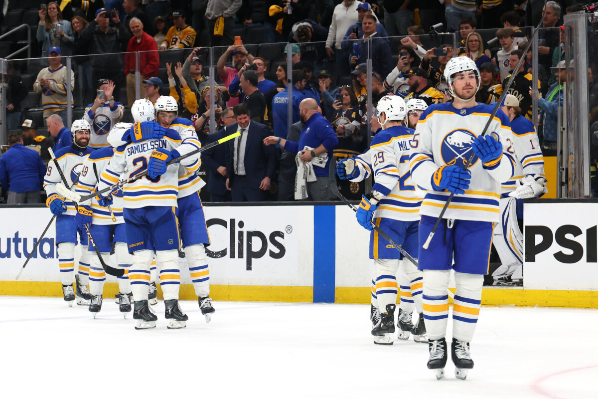 Mattias Samuelsson #23 and Tage Thompson #72 of the Buffalo Sabres celebrate after defeating the Boston Bruins 4-1 in Game 6 of the First Round of the 2026 Stanley Cup Playoffs at TD Garden in Boston, Mass., on May 1, 2026. (Bruce Bennett/Getty Images)