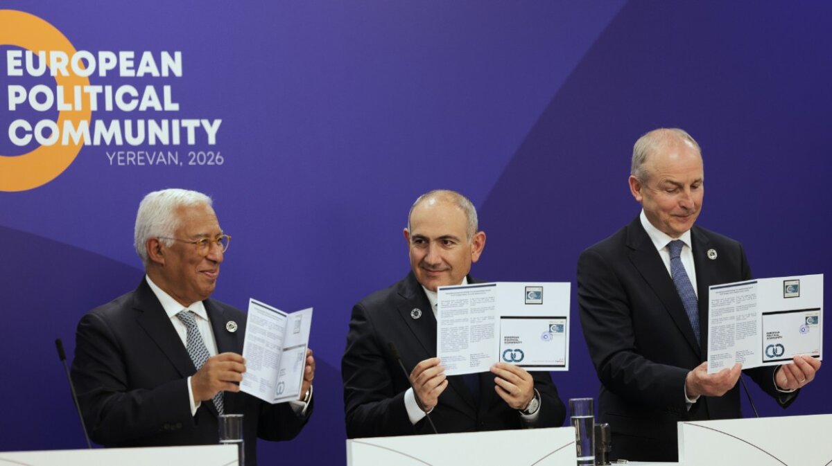 (L–R) European Council President Antonio Costa, Armenian Prime Minister Nikol Pashinyan, and Irish Prime Minister Micheal Martin hold up a commemorative stamp at a press conference during the European Political Community summit in Yerevan, Armenia, on May 4, 2026. (Anthony Pizzoferrato/AP)