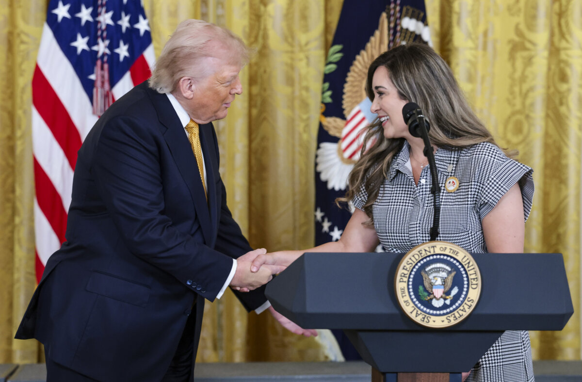 Brittany Stevenson, a Marine Corps spouse at Marine Corps Base Camp Lejeune, is greeted by President Donald Trump during a military mothers celebration in the East Room of the White House on May 6, 2026. Trump and the first lady honored the military mothers at the event ahead of Mother’s Day. (Anna Moneymaker/Getty Images)
