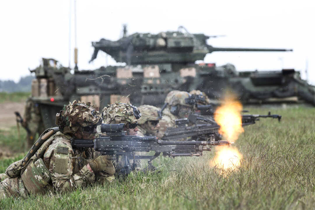 Cover image for Day in Photos: NATO Exercises in Europe, Indonesian Fishing Boats, and Conflict in the Middle East