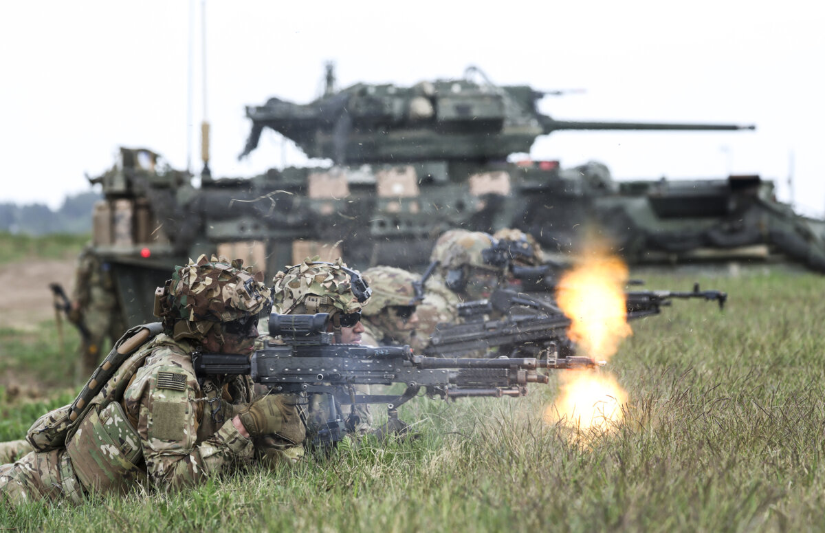 Soldiers of the U.S. Army 2nd Cavalry Regiment Stryker Brigade fire blanks during the Amber Shock 26 portion of the Saber Strike 26 NATO military exercises near Bemowo Piskie, Poland, on May 6, 2026. (Sean Gallup/Getty Images)