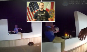 VIDEO: Sarasota Police Officer Talks Down Man in Mental Health Crisis About to Jump Off 6-Story Parkade