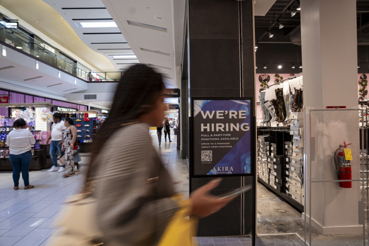 A hiring sign at a mall in Marietta, Ga., on Feb. 22, 2024. (Madalina Vasiliu/The Epoch Times)