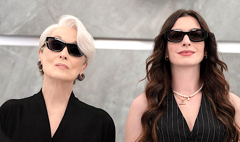 2 women, older and younger, wearing sunglasses in (Meryl Streep) and Andy (Anne Hathaway) in "The Devil Wear Prada 2.